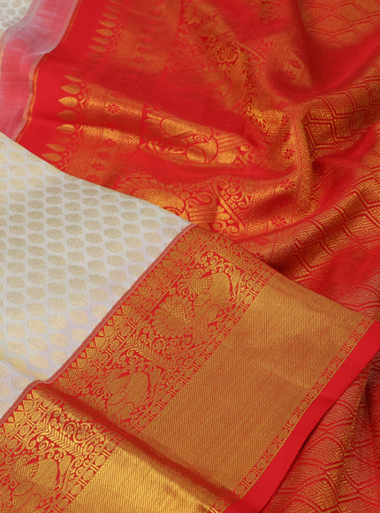 Pure kanchipuram silk saree cream and red with allover zari woven butta weaves and rich annam zari woven border