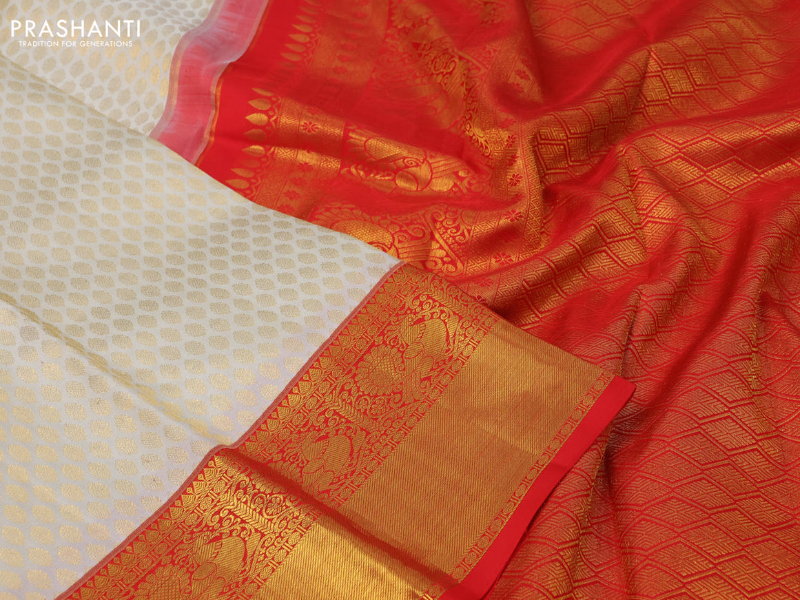 Pure kanchipuram silk saree cream and red with allover zari woven butta weaves and rich annam zari woven border