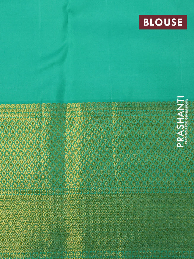 Pure kanchipuram silk saree off white and green with allover zari woven brocade weaves and long zari woven border