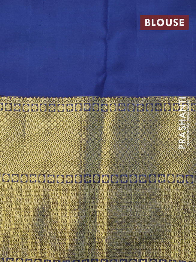 Pure kanchipuram silk saree off white and navy blue with allover zari woven brocade weaves and long rich zari woven border