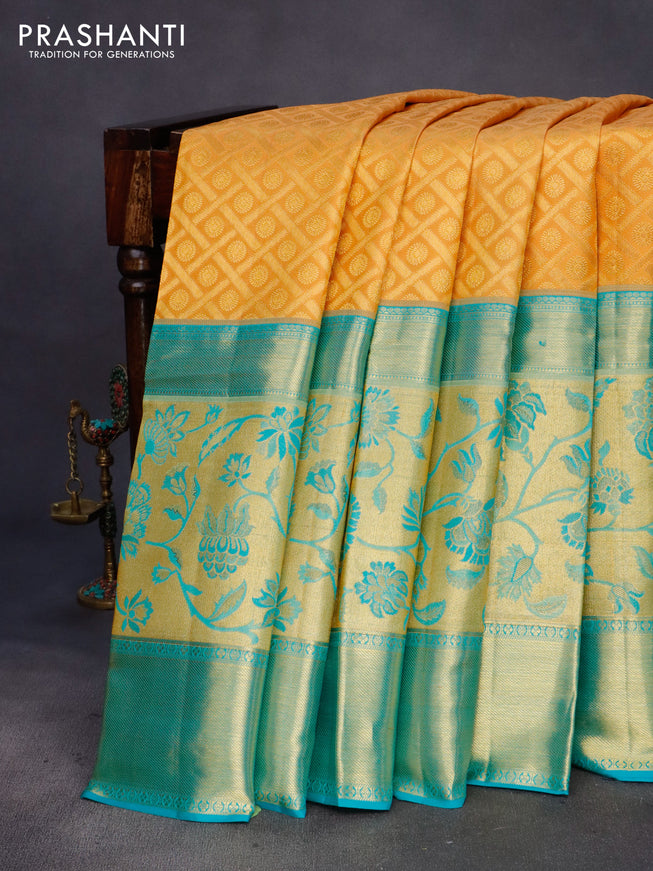 Pure kanchipuram silk saree mustard yellow and teal blue with allover zari woven brocade weaves and long zari woven border