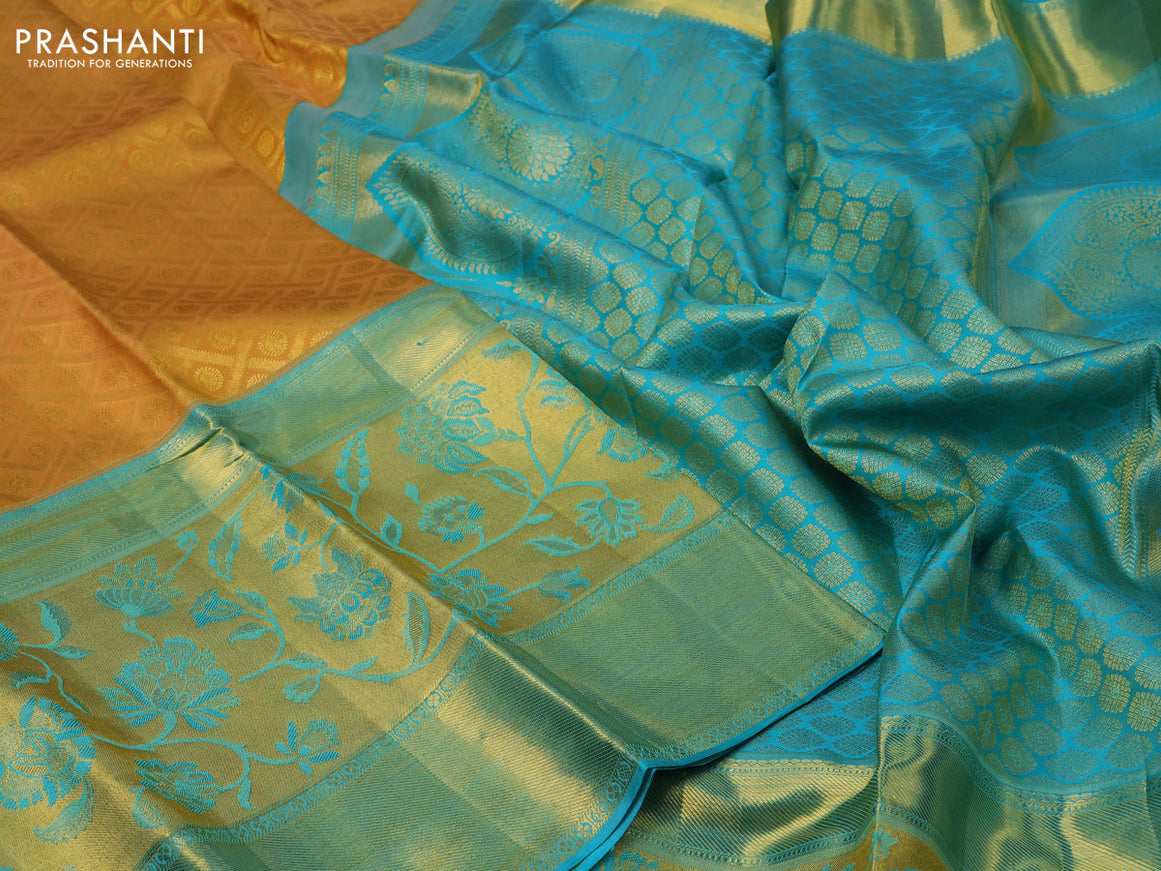 Pure kanchipuram silk saree mustard yellow and teal blue with allover zari woven brocade weaves and long zari woven border