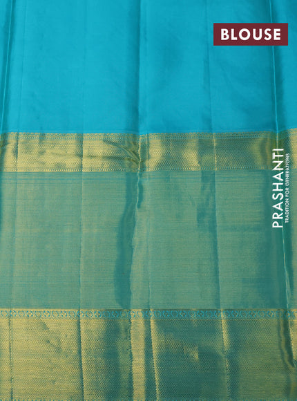 Pure kanchipuram silk saree mustard yellow and teal blue with allover zari woven brocade weaves and long zari woven border