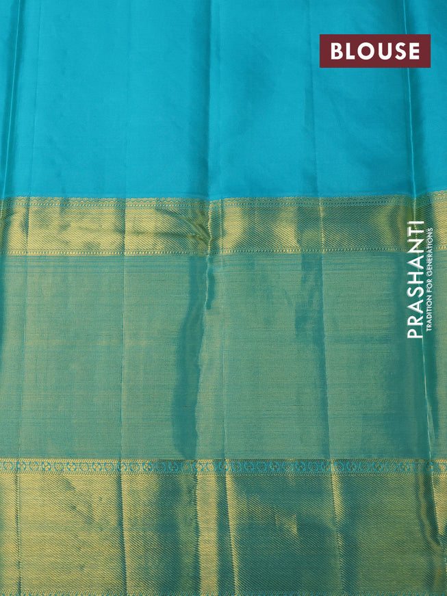 Pure kanchipuram silk saree mustard yellow and teal blue with allover zari woven brocade weaves and long zari woven border