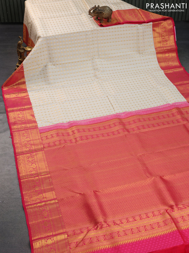 Pure kanchipuram silk saree cream and dual shade of pink with allover silver & gold zari weaves and zari woven border