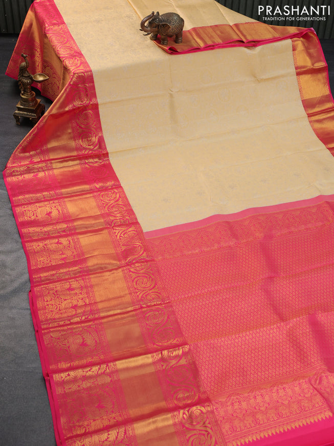 Pure kanchipuram silk saree sandal and pink with allover silver zari woven brocade weaves and long zari woven border