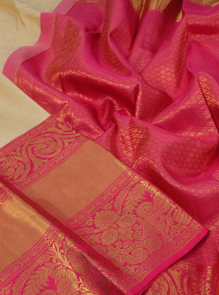 Pure kanchipuram silk saree sandal and pink with allover silver zari woven brocade weaves and long zari woven border