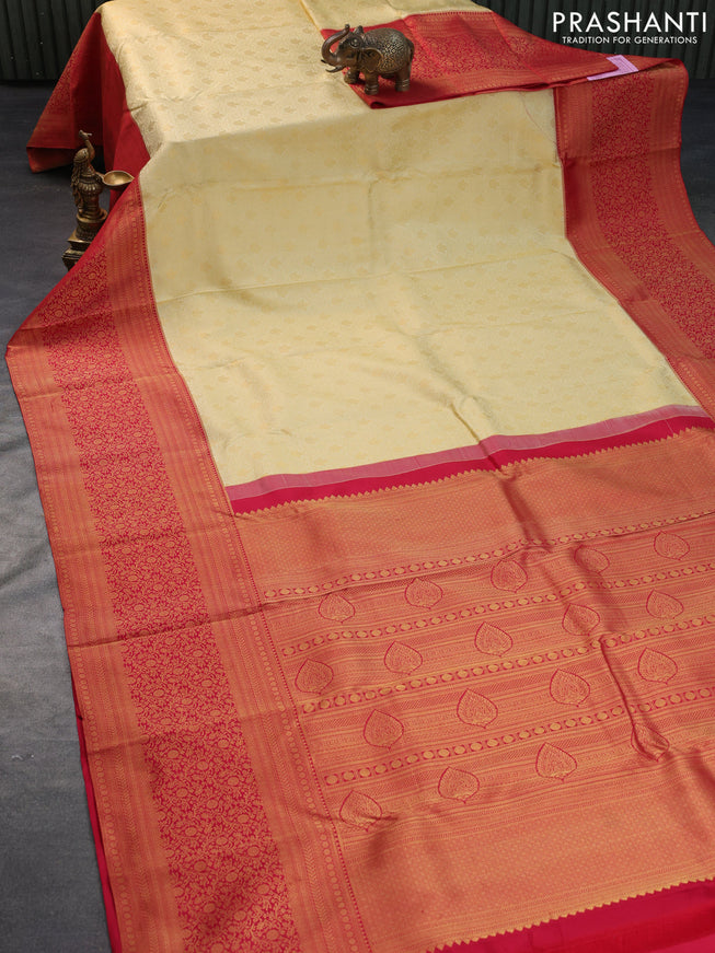 Pure kanchipuram silk saree cream and red with allover zari woven brocade weaves and long zari woven border