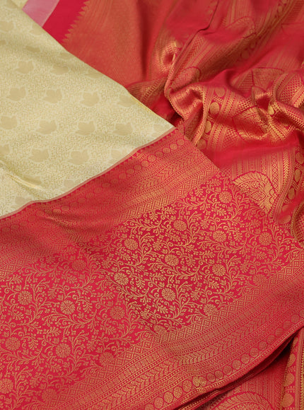 Pure kanchipuram silk saree cream and red with allover zari woven brocade weaves and long zari woven border