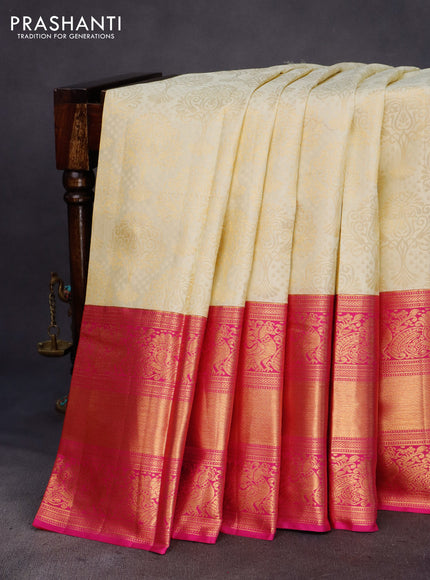 Pure kanchipuram silk saree cream and pink with allover zari woven brocade weaves and long zari woven annam border