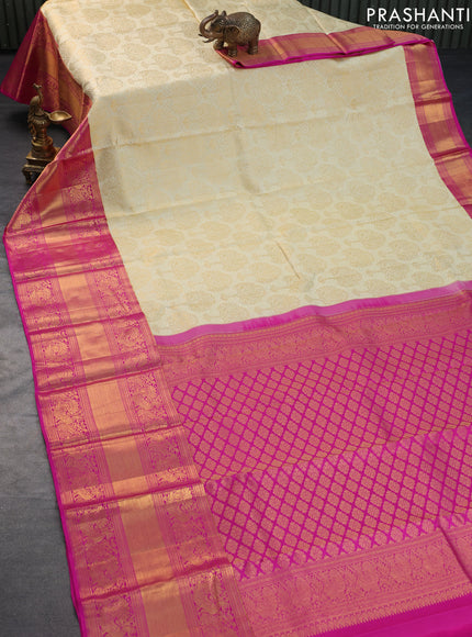 Pure kanchipuram silk saree cream and pink with allover zari woven brocade weaves and long zari woven annam border