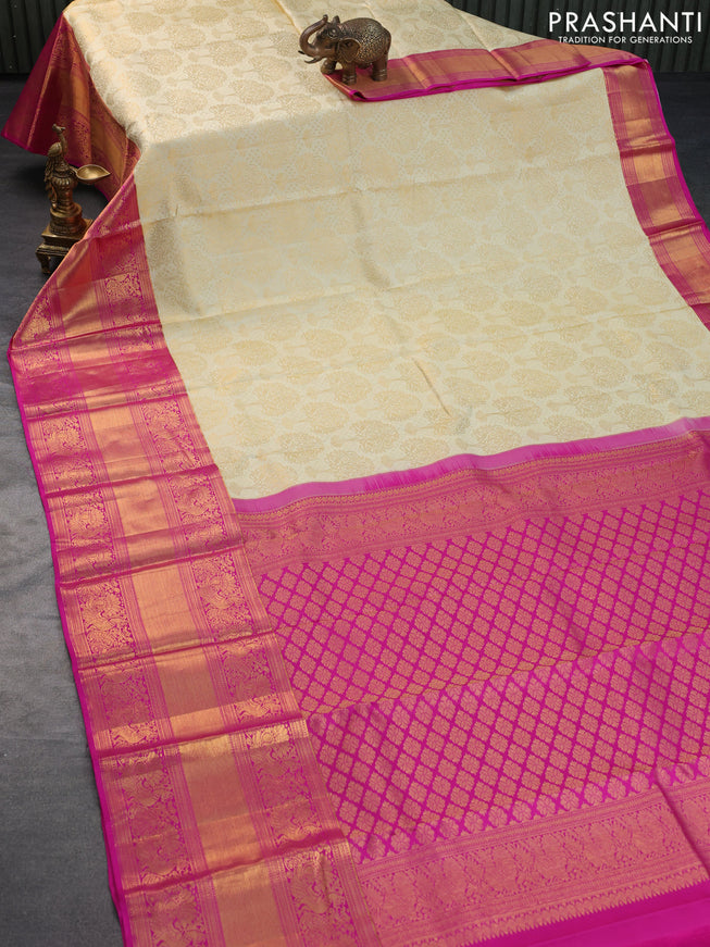 Pure kanchipuram silk saree cream and pink with allover zari woven brocade weaves and long zari woven annam border