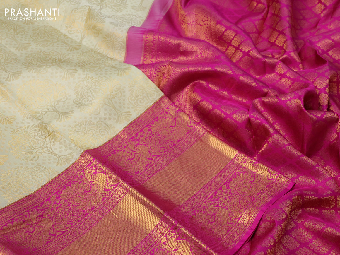 Pure kanchipuram silk saree cream and pink with allover zari woven brocade weaves and long zari woven annam border