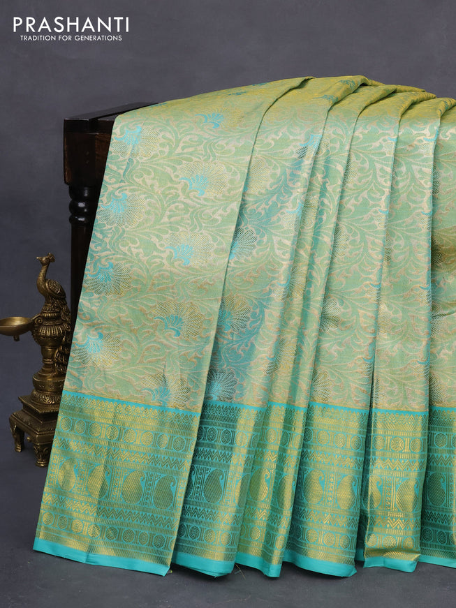 Pure kanchipuram tissue silk saree teal green shade and teal blue with allover zari woven brocade weaves and zari woven border