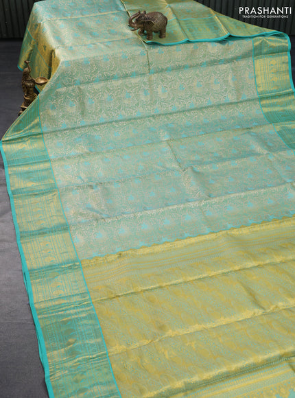 Pure kanchipuram tissue silk saree teal green shade and teal blue with allover zari woven brocade weaves and zari woven border