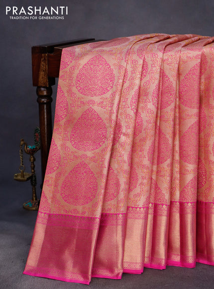 Pure kanchipuram tissue silk saree peach shade and pink with allover zari woven brocade weaves and zari woven border