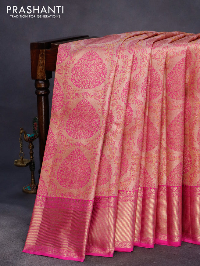 Pure kanchipuram tissue silk saree peach shade and pink with allover zari woven brocade weaves and zari woven border