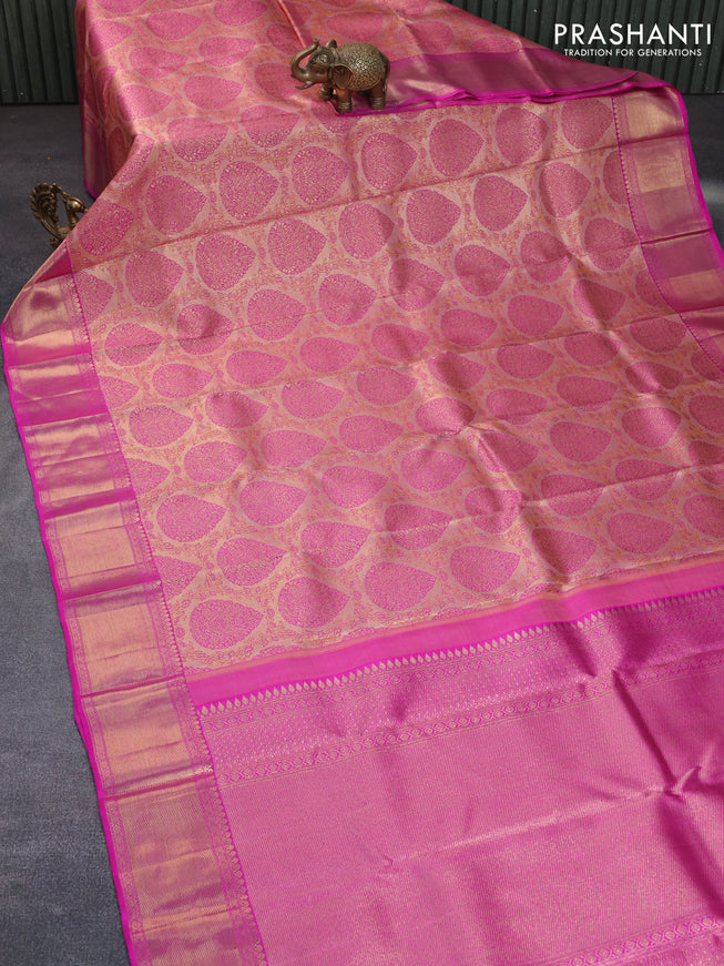 Pure kanchipuram tissue silk saree peach shade and pink with allover zari woven brocade weaves and zari woven border