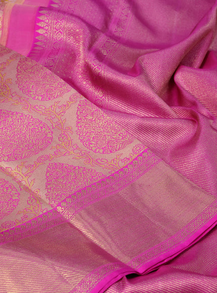 Pure kanchipuram tissue silk saree peach shade and pink with allover zari woven brocade weaves and zari woven border