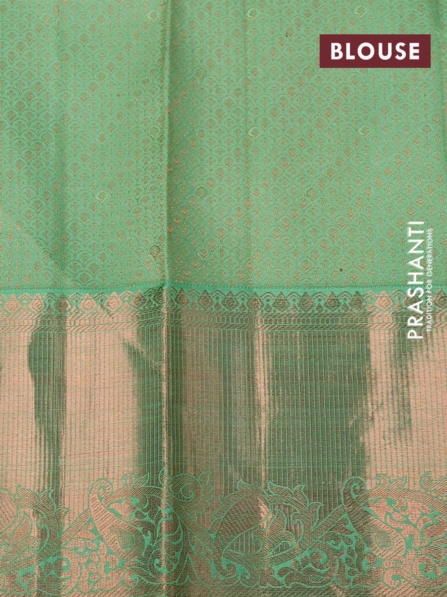 Pure kanchipuram silk saree pastel green with allover copper zari woven brocade weaves and zari woven border