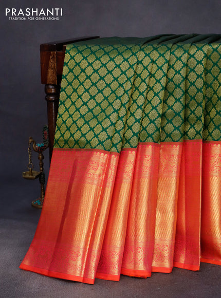 Pure kanchipuram silk saree green and dual shade of pinkish orange with allover zari woven butta weaves and long zari woven border