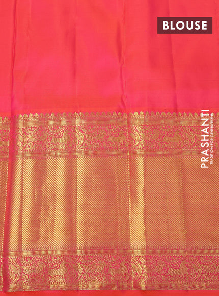 Pure kanchipuram silk saree green and dual shade of pinkish orange with allover zari woven butta weaves and long zari woven border