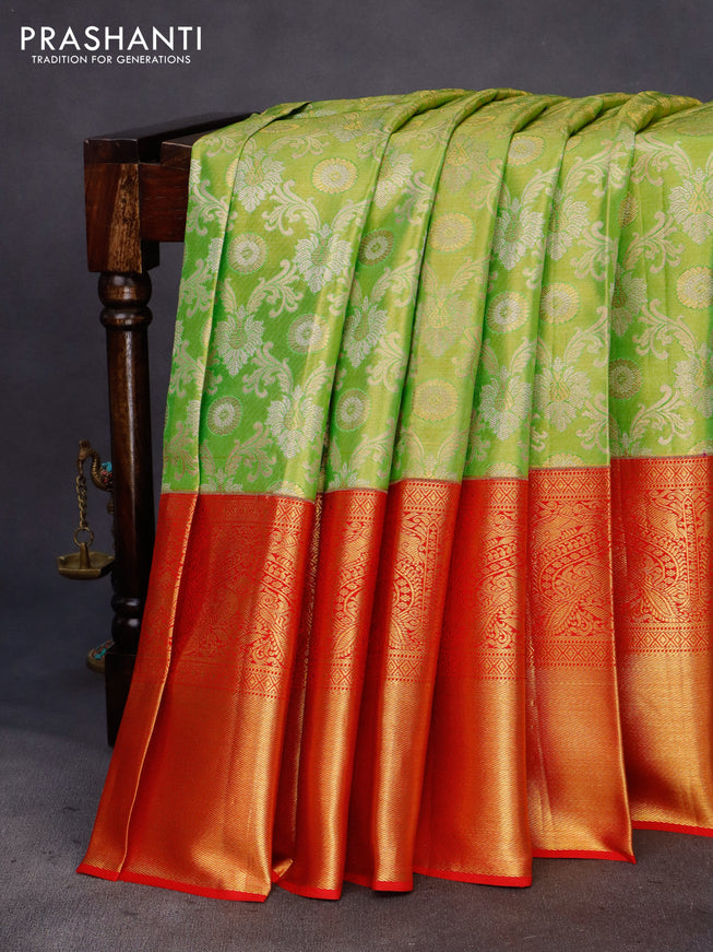 Pure kanchipuram tissue silk saree light green and red with allover zari woven brocade weaves and long zari woven border