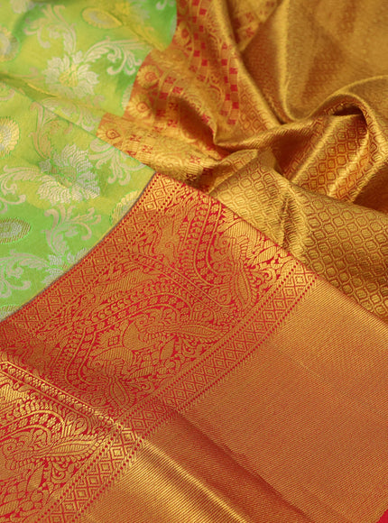 Pure kanchipuram tissue silk saree light green and red with allover zari woven brocade weaves and long zari woven border