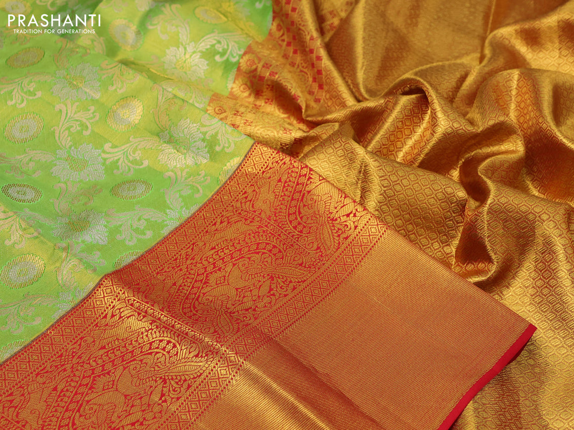 Pure kanchipuram tissue silk saree light green and red with allover zari woven brocade weaves and long zari woven border