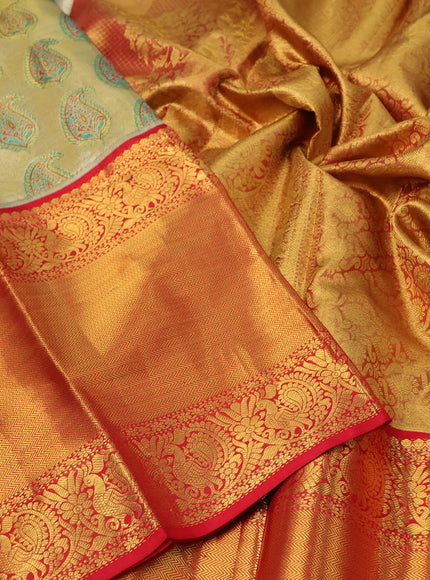 Pure kanchipuram tissue silk saree gold and red with allover zari woven brocade weaves and long annam zari woven border