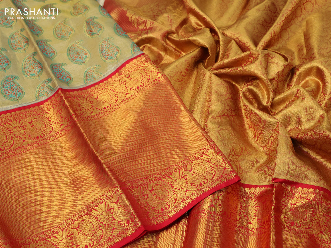 Pure kanchipuram tissue silk saree gold and red with allover zari woven brocade weaves and long annam zari woven border