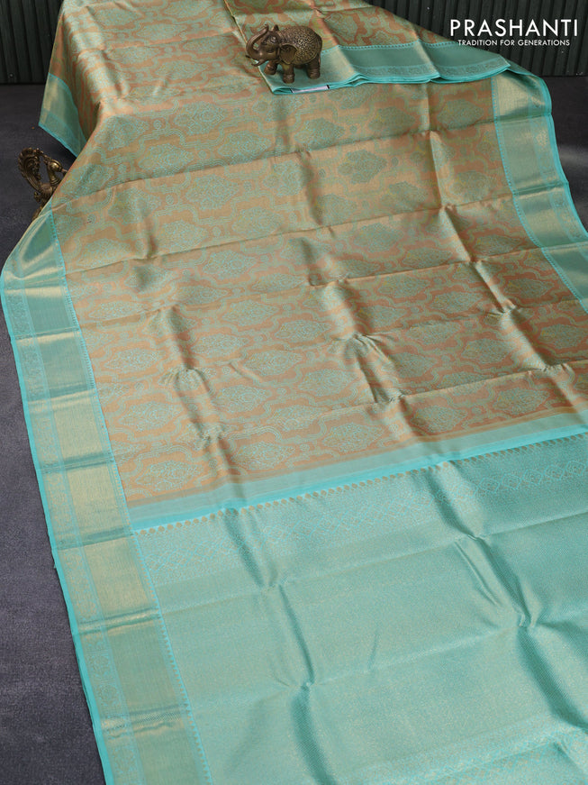 Pure kanchipuram tissue silk saree gold and teal blue with allover zari woven brocade weaves and zari woven border