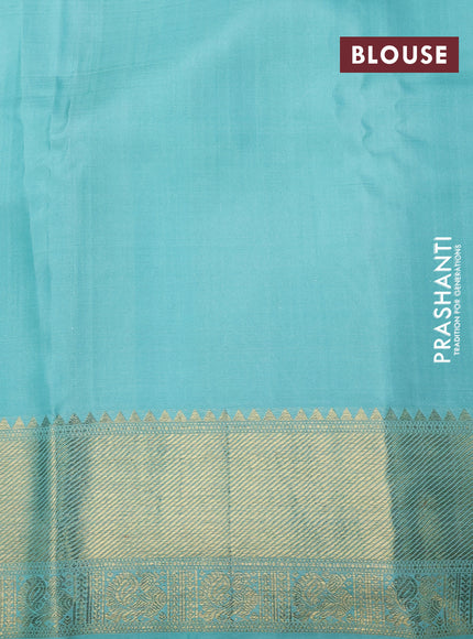 Pure kanchipuram tissue silk saree gold and teal blue with allover zari woven brocade weaves and zari woven border