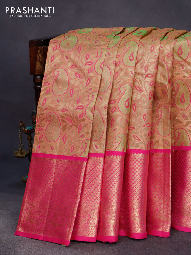 Pure kanchipuram tissue silk saree peach shade and pink with allover zari woven brocade weaves and long zari woven border