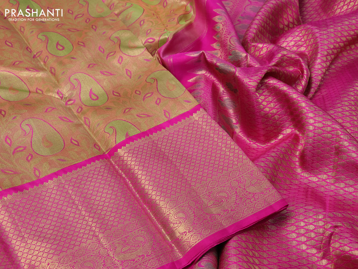 Pure kanchipuram tissue silk saree peach shade and pink with allover zari woven brocade weaves and long zari woven border