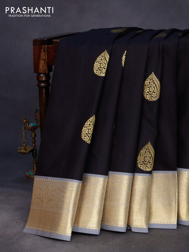 Pure kanchipuram silk saree black and grey with allover self emboss & buttas and zari woven border