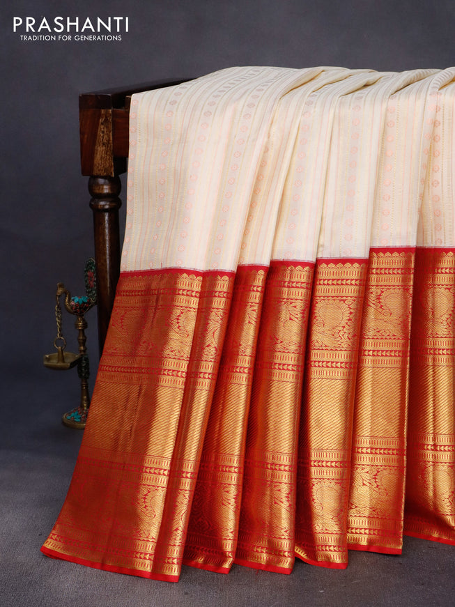 Pure kanchipuram silk saree cream and red with allover zari woven stripes pattern and long zari woven border