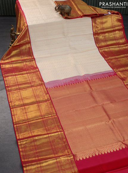 Pure kanchipuram silk saree cream and red with allover zari woven stripes pattern and long zari woven border