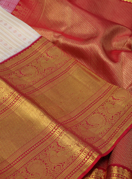 Pure kanchipuram silk saree cream and red with allover zari woven stripes pattern and long zari woven border