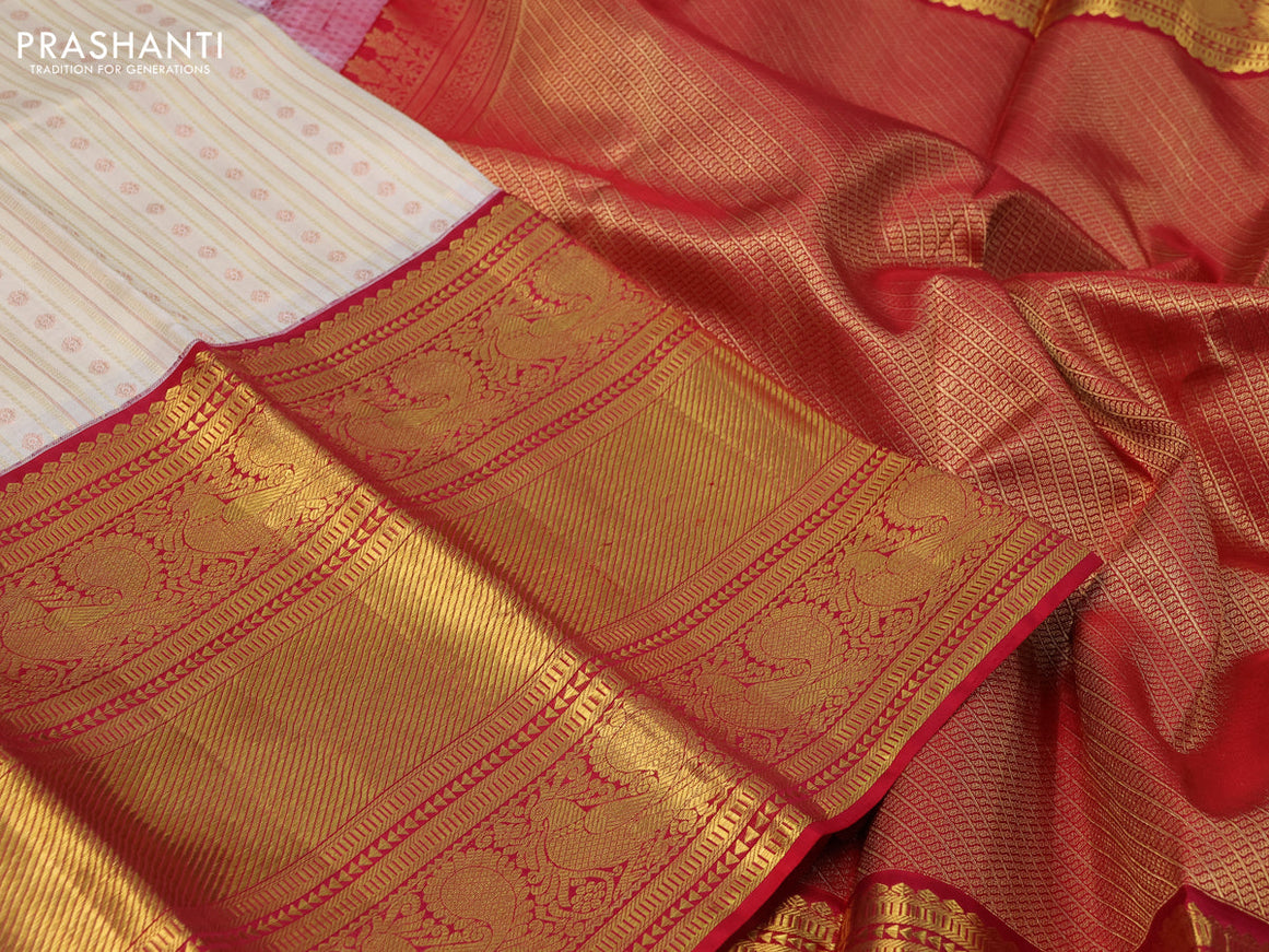 Pure kanchipuram silk saree cream and red with allover zari woven stripes pattern and long zari woven border