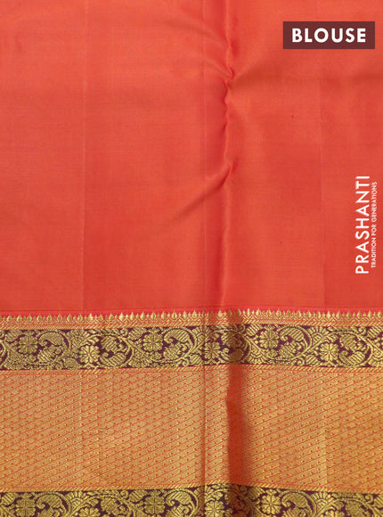 Pure kanchipuram silk saree light green and orange with paisley zari woven buttas and zari woven korvai border