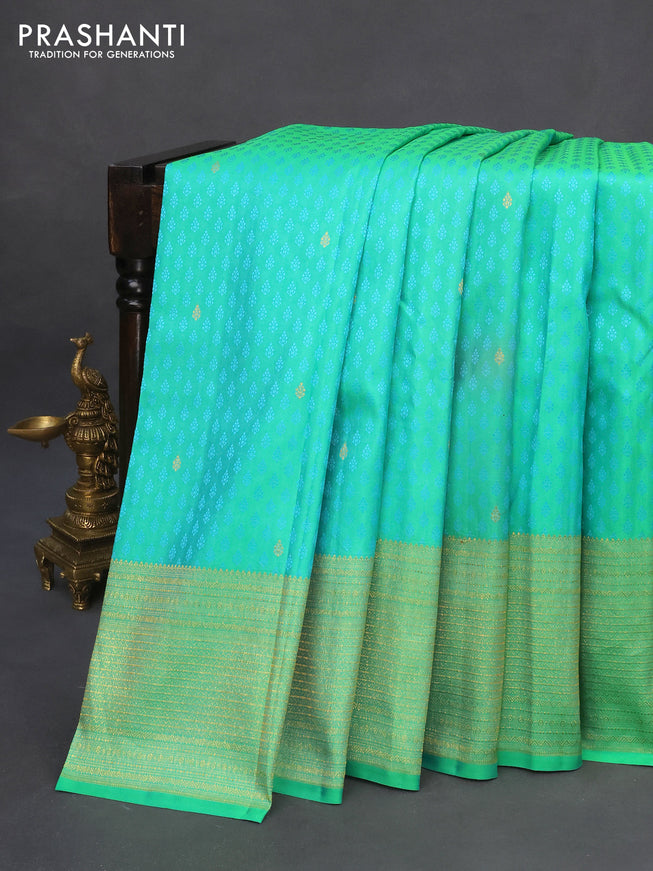 Pure kanchipuram silk saree dual shade of teal green with allover self emboss & zari buttas and zari woven border