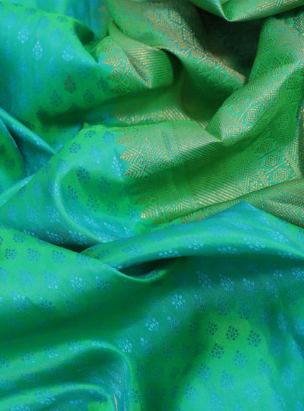 Pure kanchipuram silk saree dual shade of teal green with allover self emboss & zari buttas and zari woven border