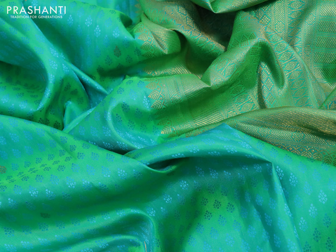 Pure kanchipuram silk saree dual shade of teal green with allover self emboss & zari buttas and zari woven border