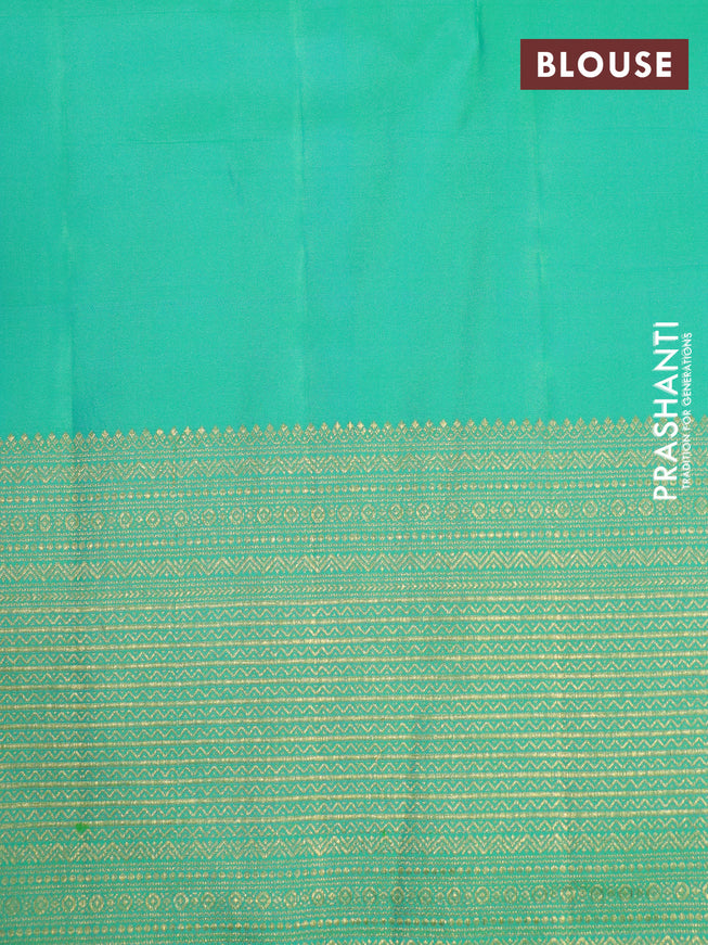 Pure kanchipuram silk saree dual shade of teal green with allover self emboss & zari buttas and zari woven border