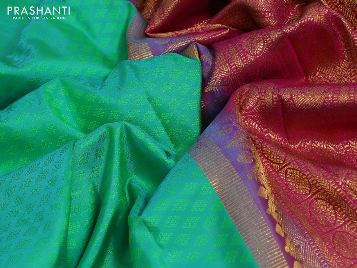 Pure kanchipuram silk saree dual shade of teal green and pink with allover self emboss and zari woven korvai border