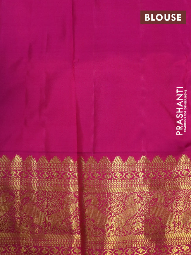 Pure kanchipuram silk saree dual shade of teal green and pink with allover self emboss and zari woven korvai border