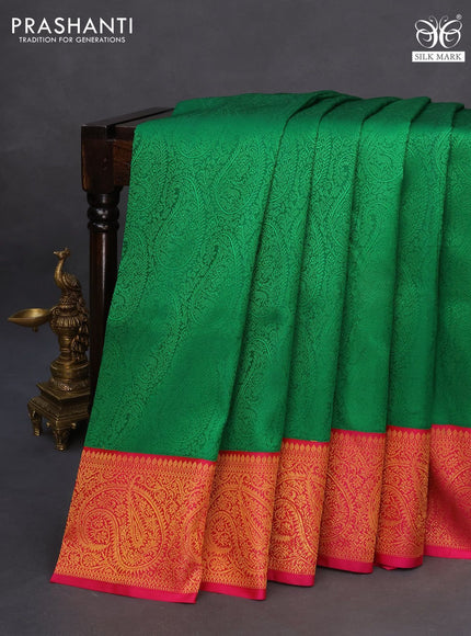 Pure kanchipuram silk saree green and pink with allover self emboss and zari woven border