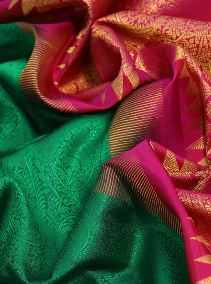 Pure kanchipuram silk saree green and pink with allover self emboss and zari woven border