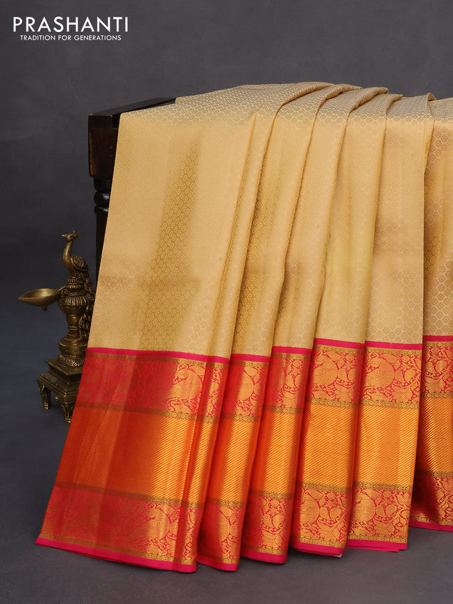 Pure kanchipuram silk saree sandal and dual shade of pink with allover self emboss and long zari woven korvai border